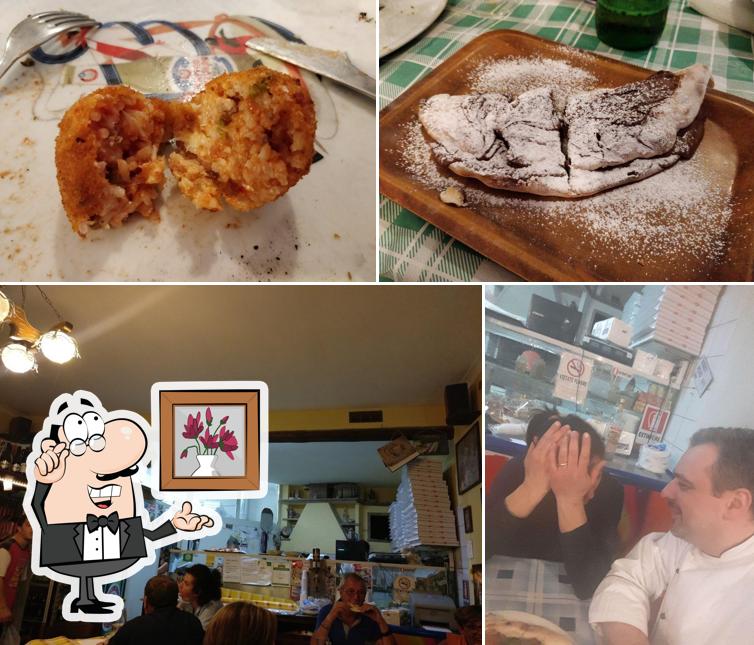 Dai un'occhiata agli interni di All'Angolo
