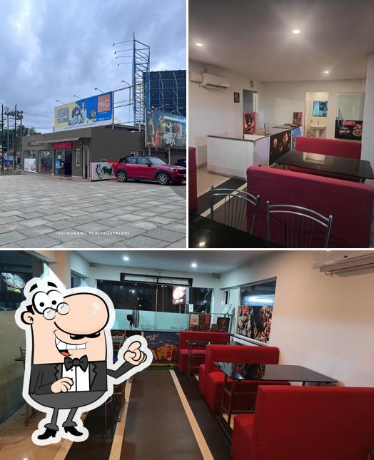 Take a look at the picture showing interior and exterior at Pizza 10 Harippad
