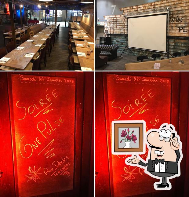 Installez-vous à l'une des tables de Bar brasserie Pizzeria aux Docks
