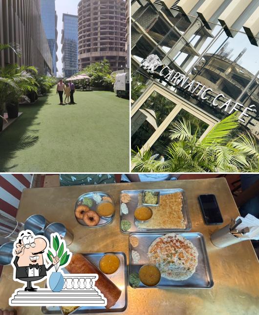 Check out the picture depicting exterior and interior at Carnatic Cafe