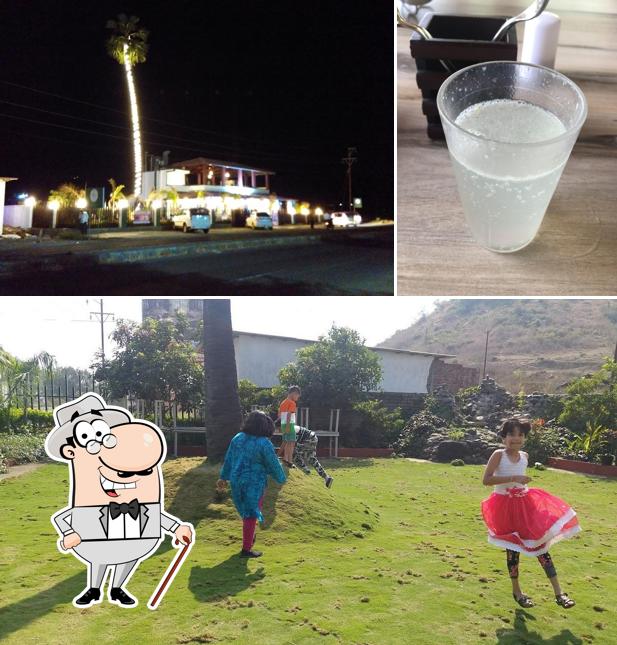 Take a look at the image showing exterior and beverage at Palm Tree Family Restaurant