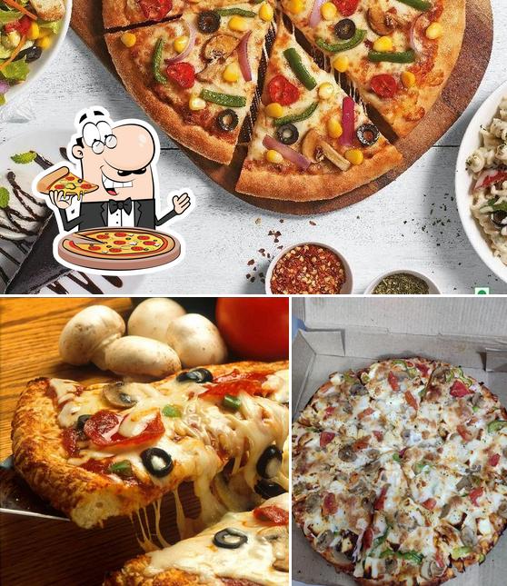 Get pizza at Pizza Hot Family Restaurant