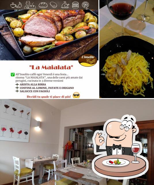 Questa è la immagine che presenta la cibo e tavolo da pranzo di L'Insolito Caffé