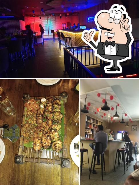 Take a seat at one of the tables at Element E7 RestroBar