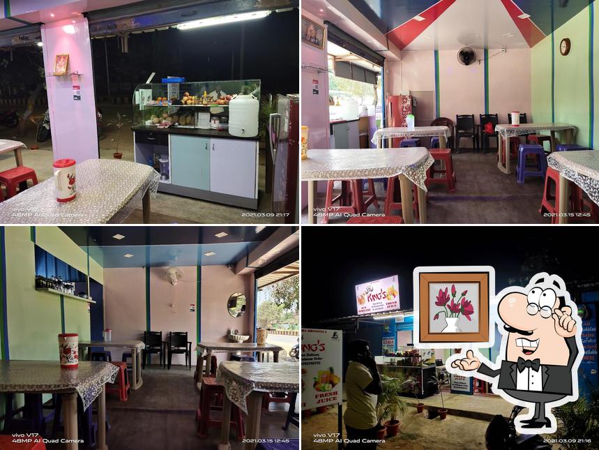 Among various things one can find interior and food at King's Mini Restaurant