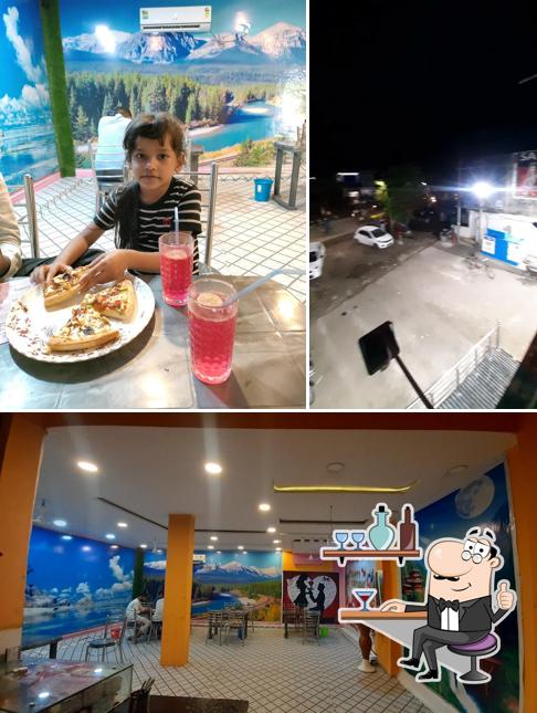 The interior of New pizza hot Cafe and restaurants