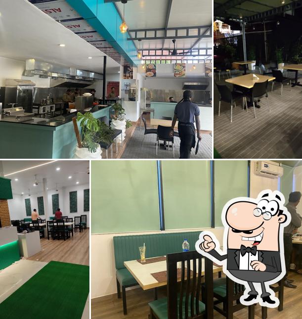 The interior of Signature By Metro Multicuisine Restaurant Kasaragod