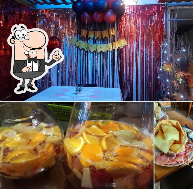 La foto di interni e cibo da Tropical Pizza