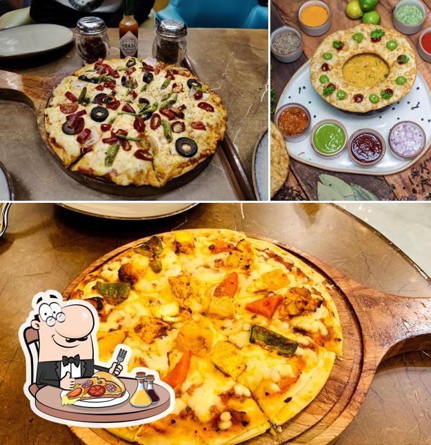 Try out pizza at Godwit Cafe Best Cafes in Indore Best Jain food in Indore Pure Veg restaurant