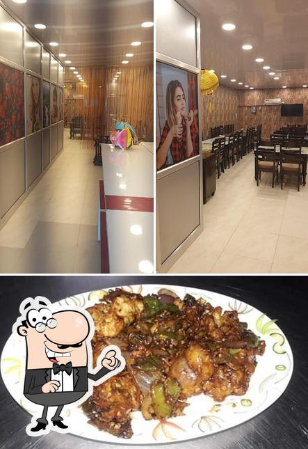 This is the image depicting interior and meat at GLORIOUS RESTAURANT PURE VEG. RESTAURANT JIND HARYANA