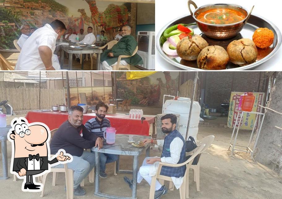 Check out the photo depicting interior and food at Dal Baati