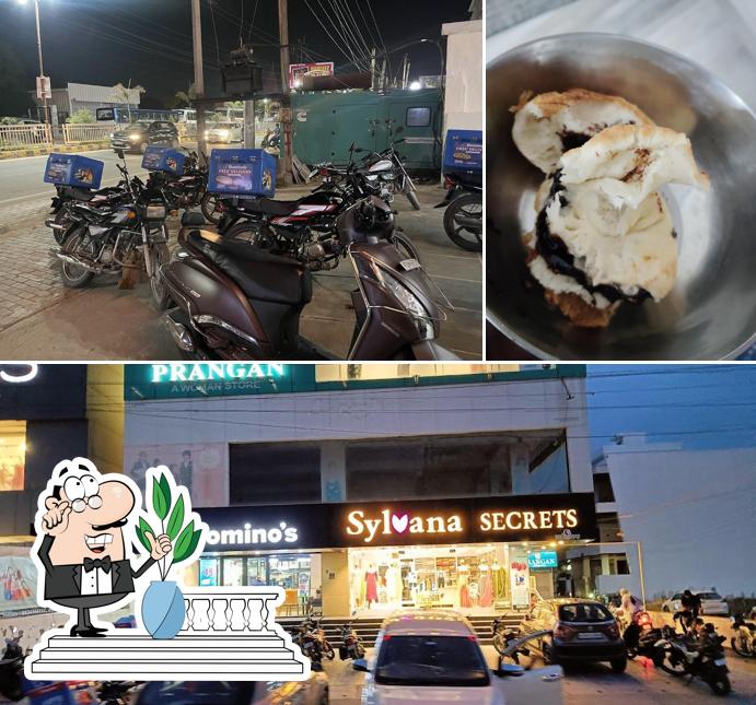 The photo of Domino's’s exterior and food