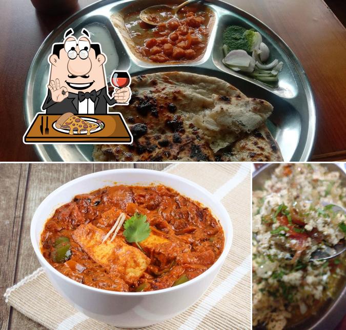 Try out pizza at Surya Dhaba