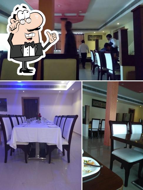 The interior of Sree Nidhi Multicuisine Restaurant
