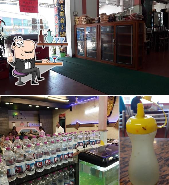 Take a look at the image depicting interior and beverage at Manikkada Family Restaurant