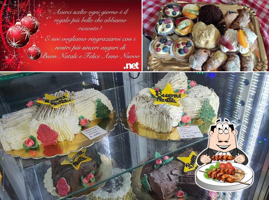 Questa è la foto che presenta la cibo e lavagna di "La Favorita" Bar Pasticceria