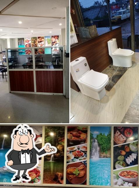 The photo of interior and exterior at Shree Panjurlli Family Restaurant