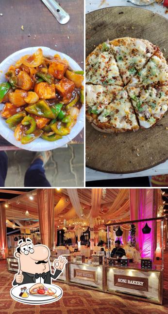 Get pizza at KUKU BAKERY