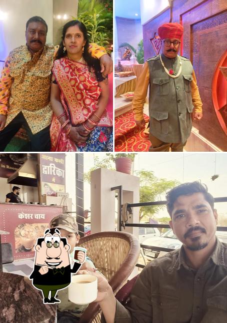 Enjoy a beverage at POOJA HOTEL AND FAMILY RESTAURANT