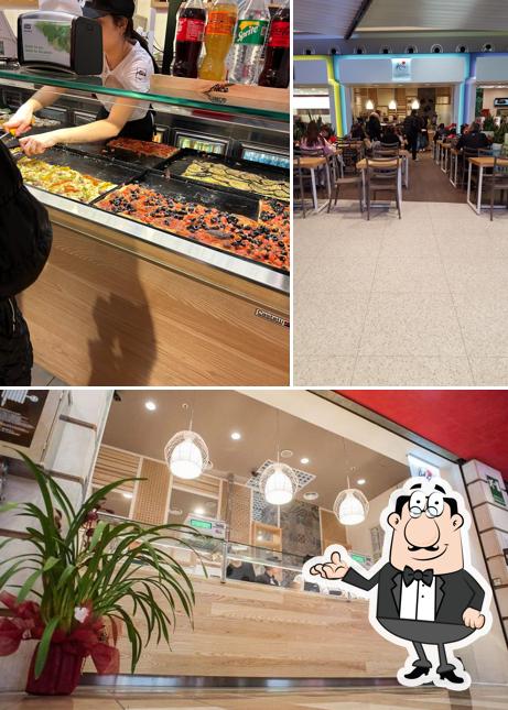 Dai un'occhiata agli interni di Alice Pizza