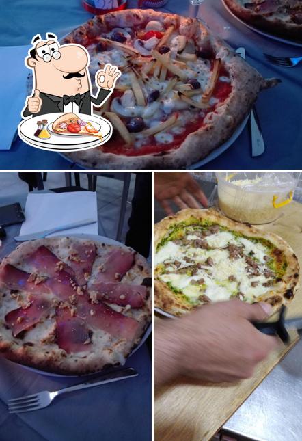 Prenditi una pizza a Ristorante Pizzeria Pub "il Rugantino In"