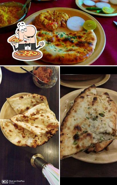 Try out pizza at Ballygunge Dhaba