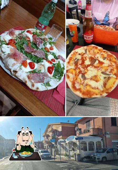 Guarda la immagine che mostra la cibo e esterno di Pizzeria Melody