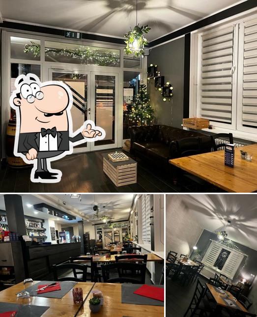 Dai un'occhiata agli interni di Ristorante Pizzeria La Pergola Di Napoleone