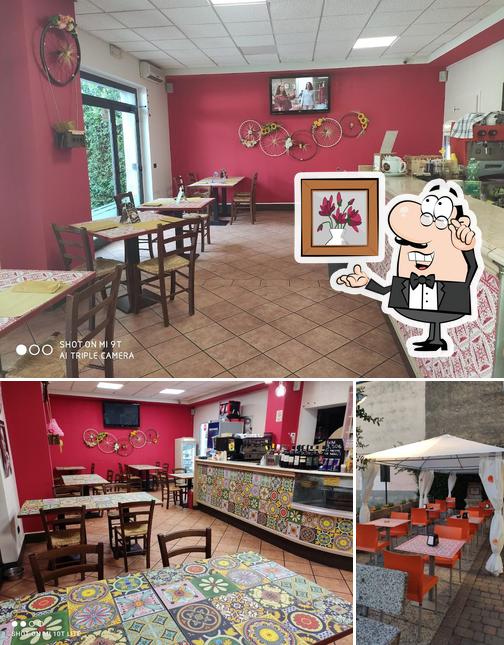 Dai un'occhiata agli interni di Sergio's pizza