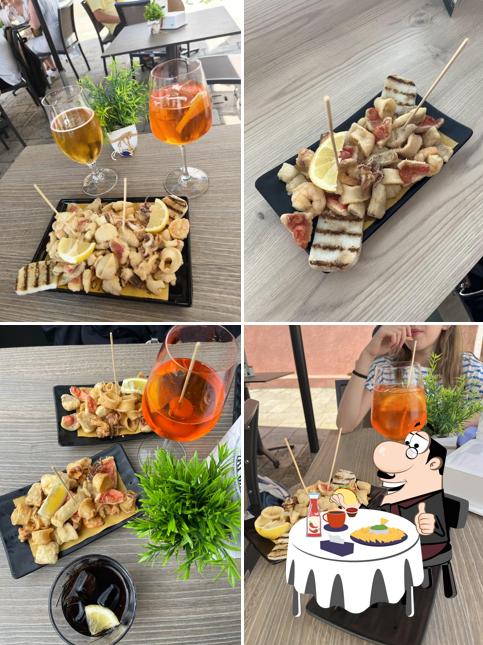 Piatto di formaggi al AI BANKY Specialità locali di pesce