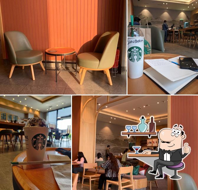 Take a seat at one of the tables at Starbucks