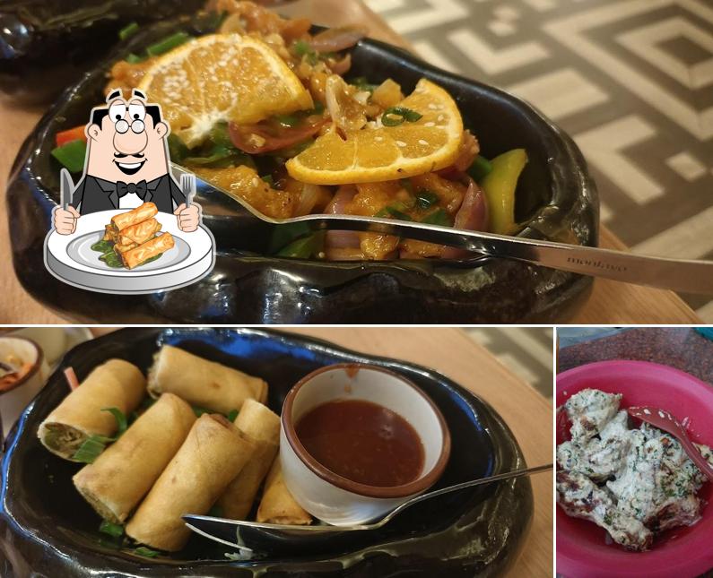 Spring rolls at Sandoz Restaurant - Dwarka