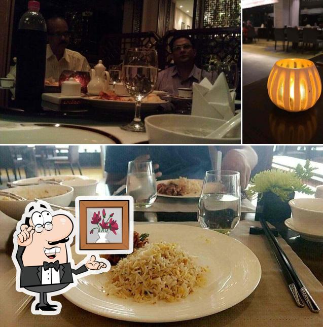 Take a seat at one of the tables at Ming Yang