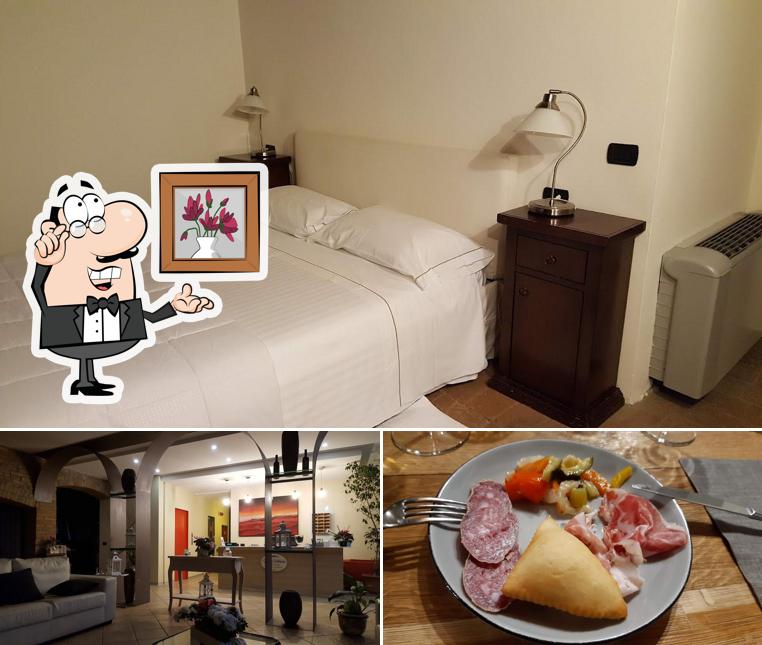 Questa è la immagine che presenta la interni e cibo di Villa Costanza Hotel & Gourmet Restaurant