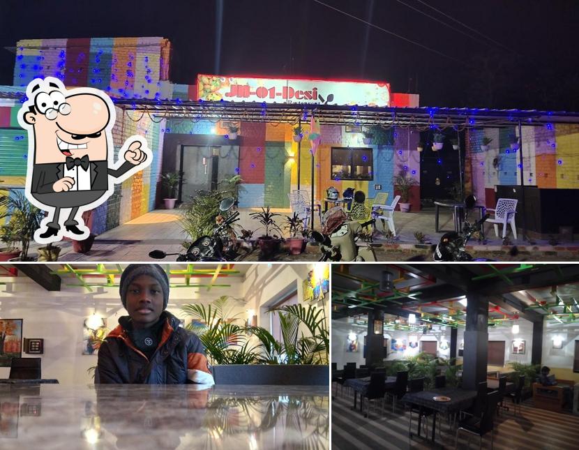 Take a seat at one of the tables at JH01 Desi Restaurant