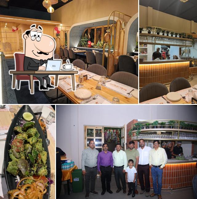 Take a seat at one of the tables at Kake Di Hatti - Banashankari