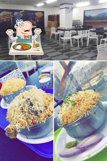 Check out the photo showing food and interior at GRAND MODERN FOOD COURT