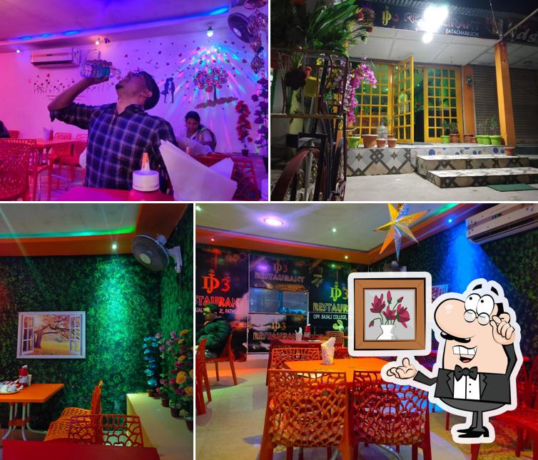 Take a seat at one of the tables at DJ RESTAURANT