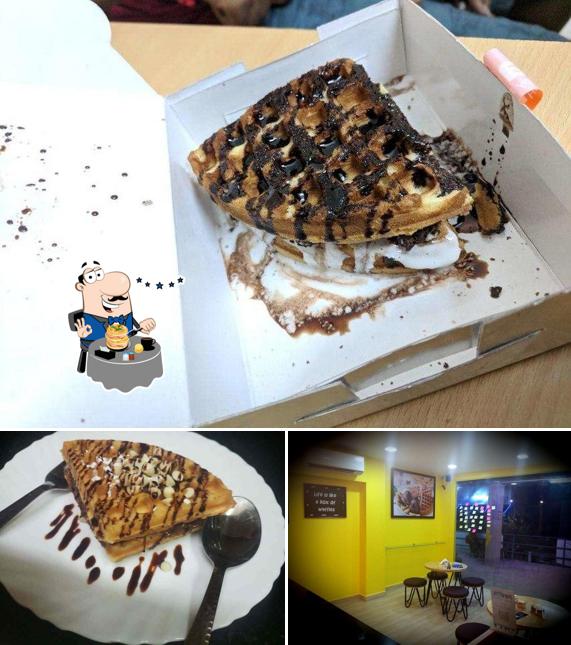Take a look at the image showing food and interior at Waffkinz