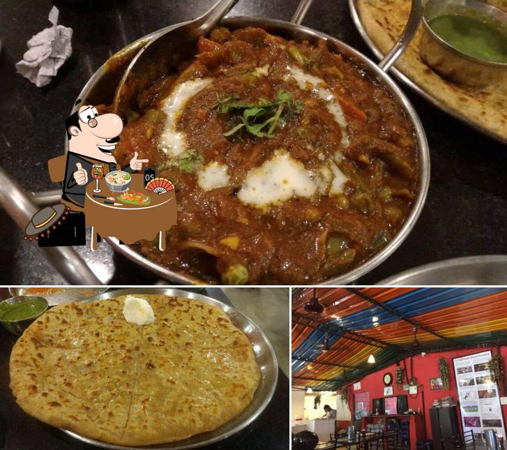 Among various things one can find food and bar counter at Kapoor's Cafe