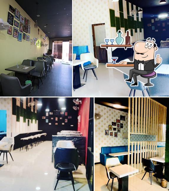Take a seat at one of the tables at King Meal Fast Food Amarkot