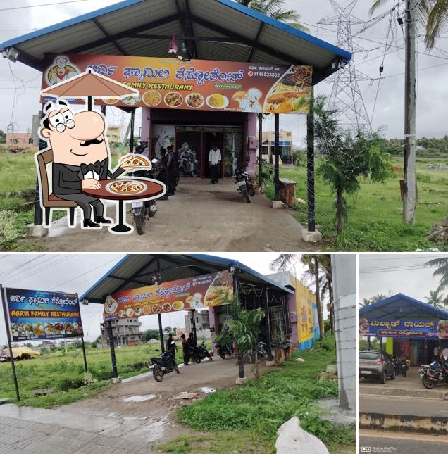 The exterior of Malnad royals veg and non veg restaurant and you can find fantastic pan shop opposite to it