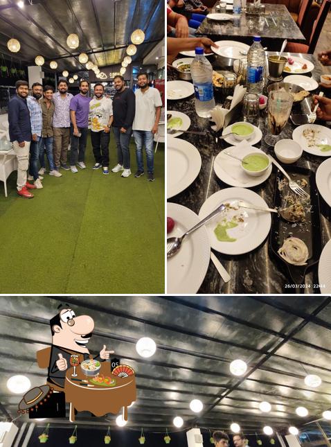 Take a look at the image showing food and interior at Cloud 9