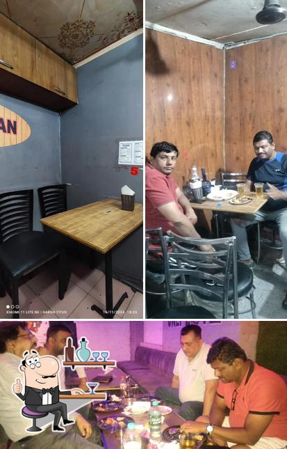 Take a seat at one of the tables at J.S MAKHAN FISH AND CHICKEN