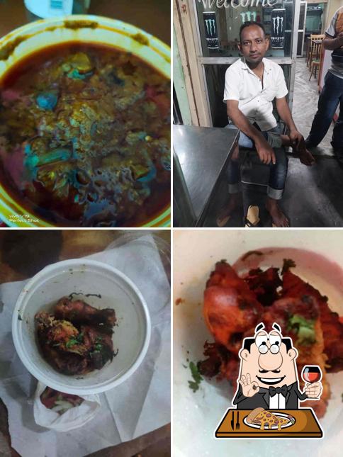 Pick pizza at Khushi Restaurant