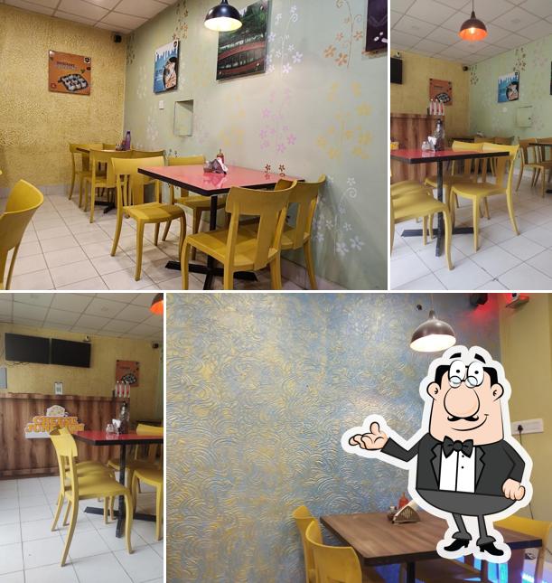 Take a seat at one of the tables at Cheese Junction