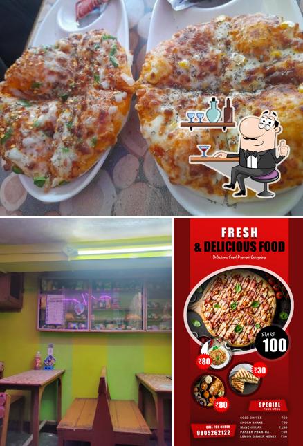 This is the picture displaying interior and food at Coffee Time open