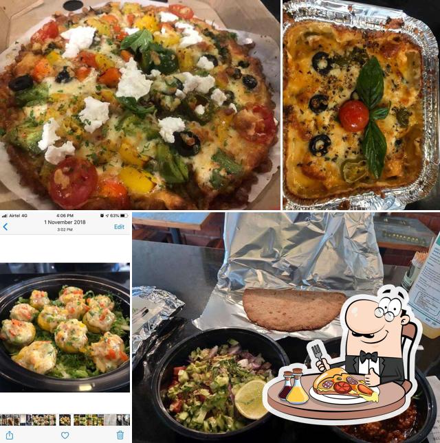 Get pizza at Flavora (Malviya Nagar)