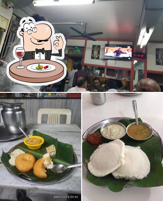 Check out the image depicting food and interior at Srinu Hotel
