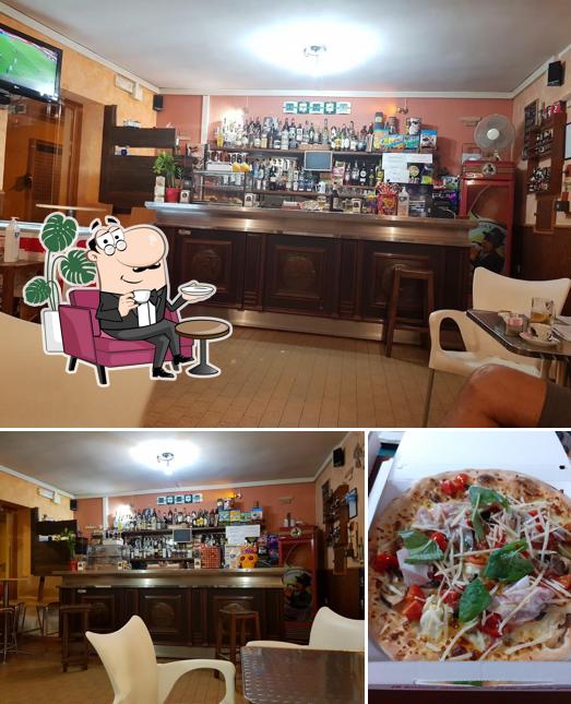 La foto di interni e pizza da Su Boddeu